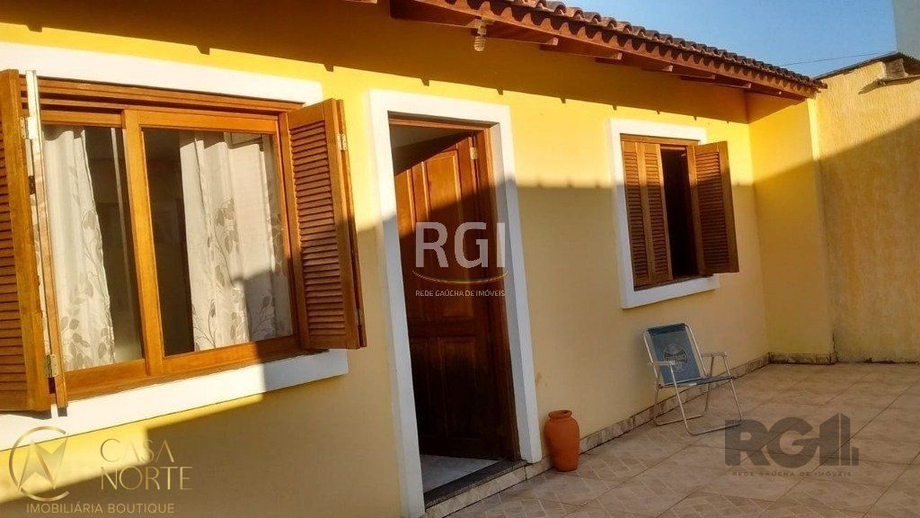Casa à venda com 2 quartos, 71m², 3 vagas, Rua Mário Vieira Marques no bairro Hípica em Porto Alegre