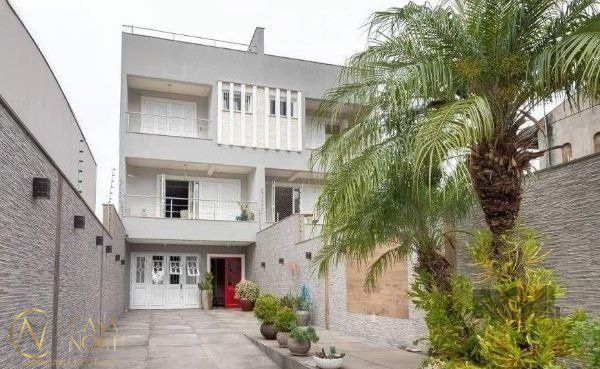 Casa à venda com 4 quartos, 395m², 3 suítes, 3 vagas, Rua Arnaldo Ballve no bairro Jardim Itu em Porto Alegre