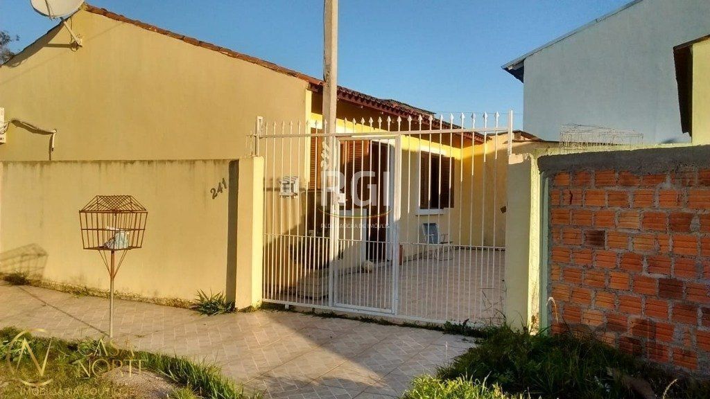 Casa à venda com 2 quartos, 71m², 3 vagas, Rua Mário Vieira Marques no bairro Hípica em Porto Alegre