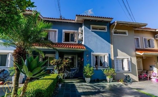 Casa de Condomínio à venda com 3 quartos, 148m², 1 suíte, 2 vagas, Estrada João Salomoni no bairro Vila Nova em Porto Alegre