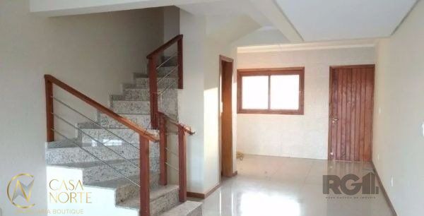 Casa à venda com 2 quartos, 151m², 1 suíte, 2 vagas, Rua Hugo Nelson Magalhaes no bairro Parque Santa Fé em Porto Alegre