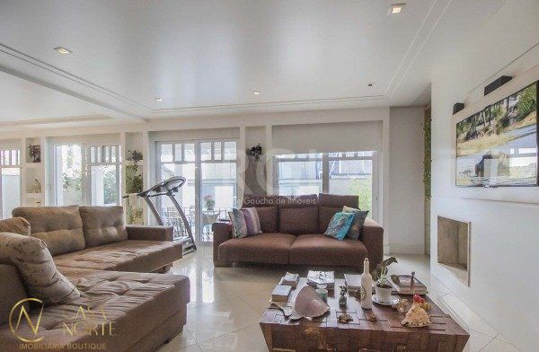 Casa de Condomínio à venda com 5 quartos, 375m², 5 suítes, 4 vagas, Rua Attílio Bilibio no bairro Jardim Carvalho em Porto Alegre