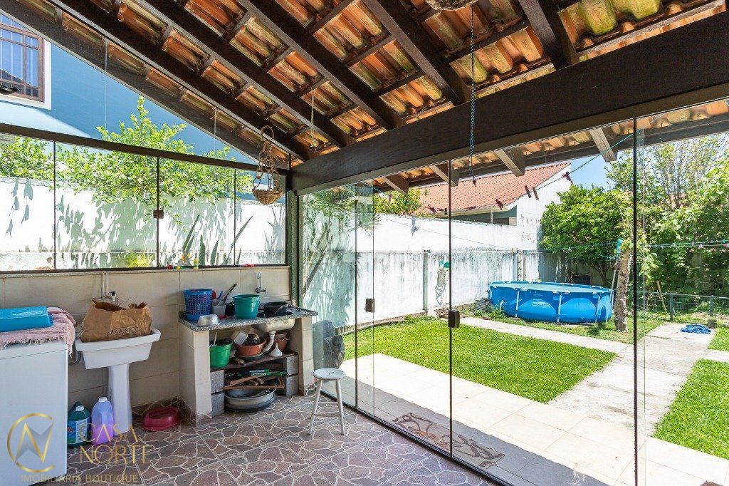 Casa à venda com 4 quartos, 170m², 2 suítes, 2 vagas, Rua Jayme Saul de Borba no bairro Espírito Santo em Porto Alegre