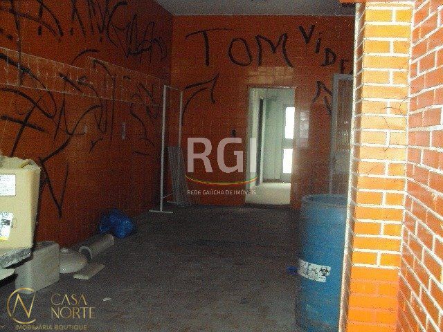Casa à venda com 5 quartos, 390m², 2 vagas, Rua Barao de Bage no bairro Vila Jardim em Porto Alegre