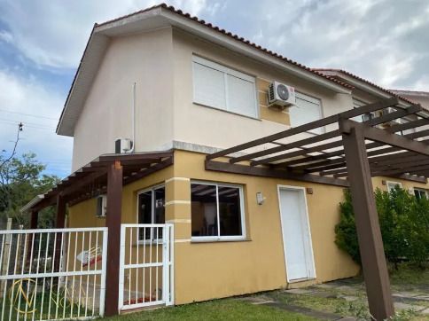 Casa de Condomínio à venda com 3 quartos, 187m², 1 suíte, 2 vagas, Rua Adão Gregory no bairro Mário Quintana em Porto Alegre