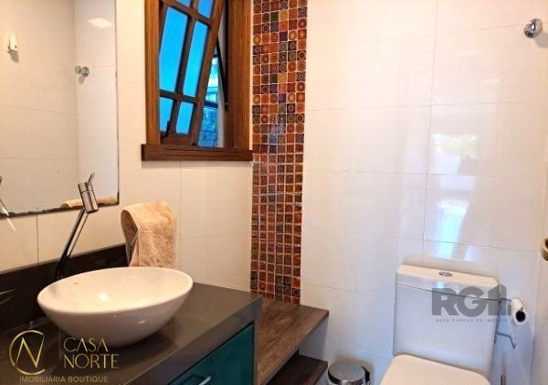 Casa de Condomínio à venda com 4 quartos, 268m², 1 suíte, 2 vagas, Avenida Flamengo no bairro Ipanema em Porto Alegre
