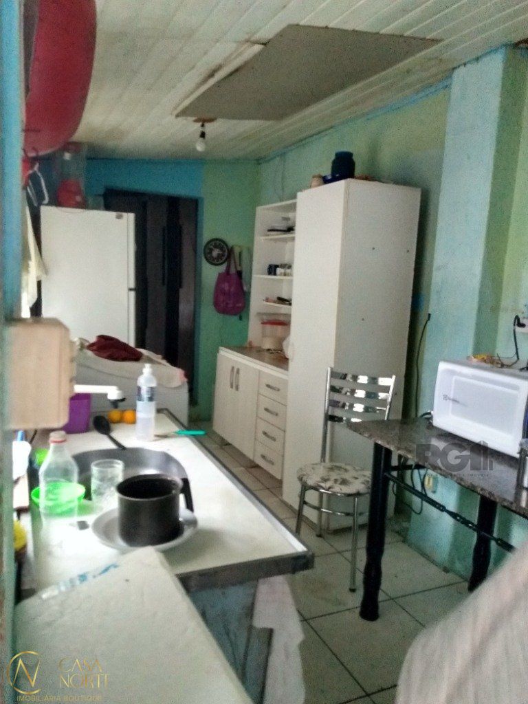 Casa à venda com 4 quartos, 293m², 1 suíte, 3 vagas, Rua Delegado Grant no bairro Santana em Porto Alegre