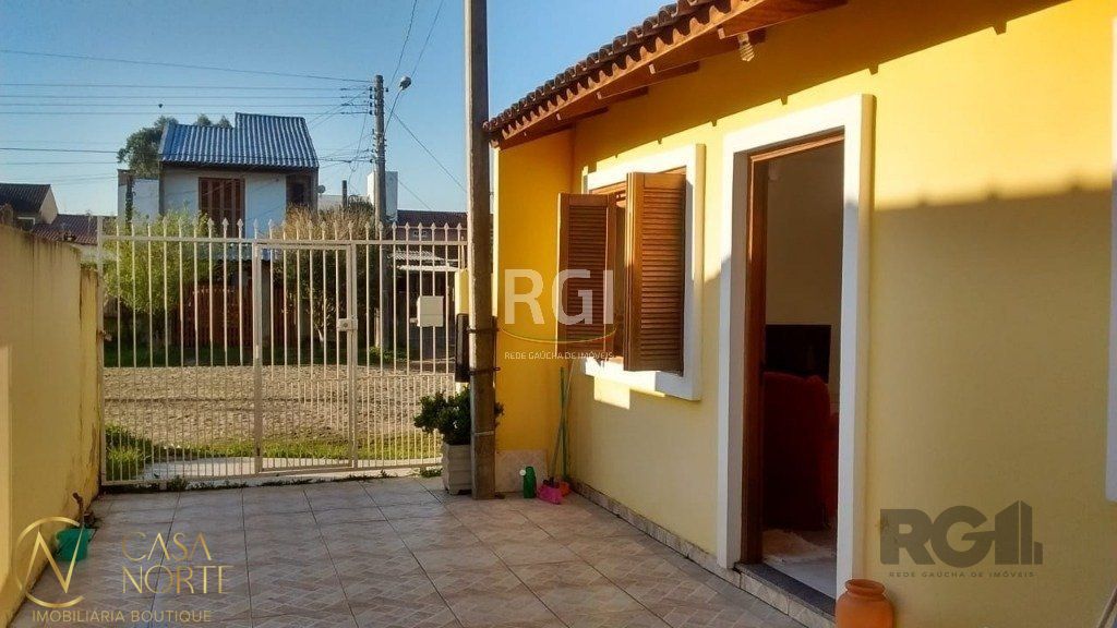 Casa à venda com 2 quartos, 71m², 3 vagas, Rua Mário Vieira Marques no bairro Hípica em Porto Alegre