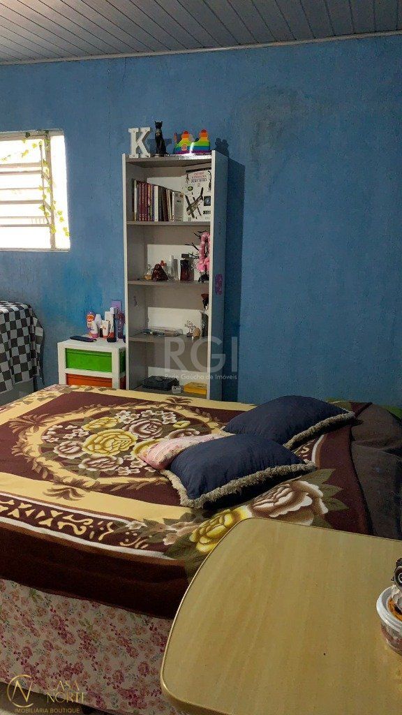 Casa à venda com 4 quartos, 180m², 4 vagas, Rua Fernando Borba no bairro Cavalhada em Porto Alegre