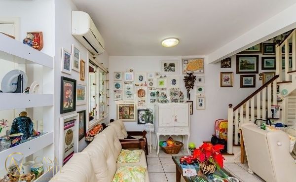 Casa de Condomínio à venda com 3 quartos, 148m², 1 suíte, 2 vagas, Estrada João Salomoni no bairro Vila Nova em Porto Alegre