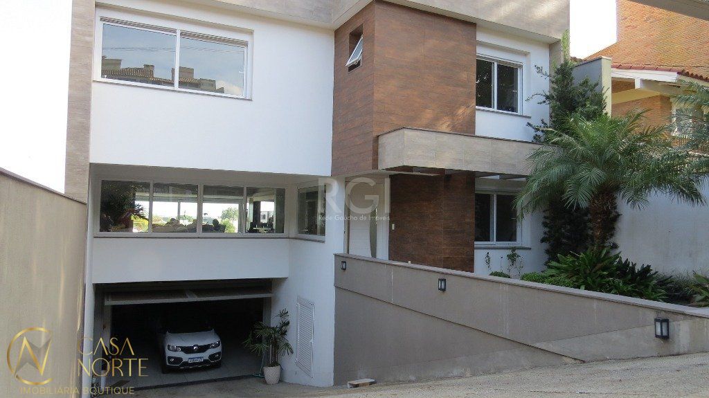 Casa à venda com 4 quartos, 427m², 4 suítes, 4 vagas, Rua Conselheiro Xavier da Costa no bairro Ipanema em Porto Alegre