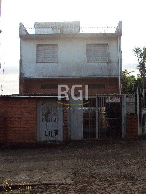 Casa à venda com 5 quartos, 390m², 2 vagas, Rua Barao de Bage no bairro Vila Jardim em Porto Alegre