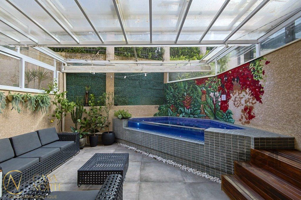 Casa de Condomínio à venda com 3 quartos, 206m², 1 suíte, 2 vagas, Rua Paulo Madureira Coelho no bairro Alto Petrópolis em Porto Alegre