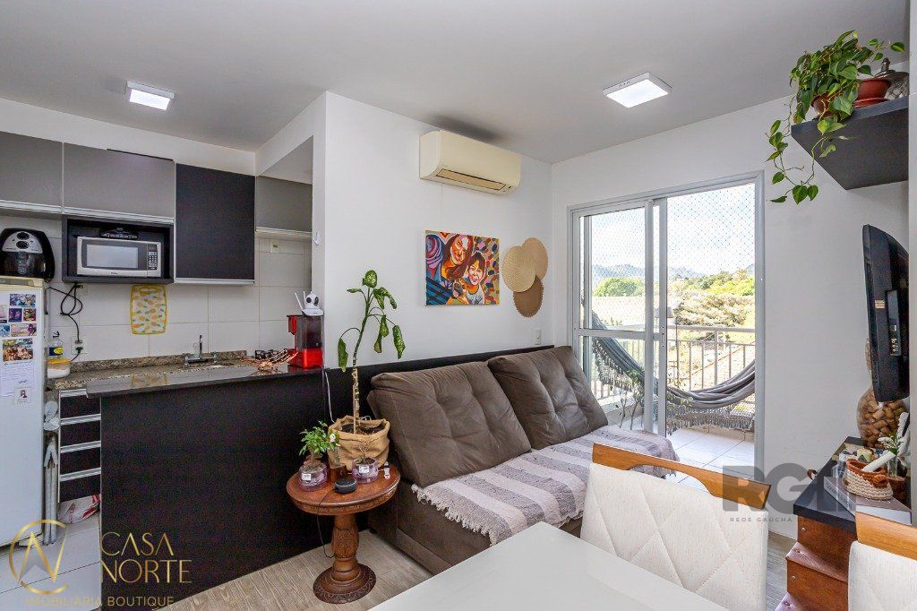 Apartamento à venda com 2 quartos, 52m², 1 suíte, 1 vaga, Avenida Arnaldo Bohrer no bairro Teresópolis em Porto Alegre