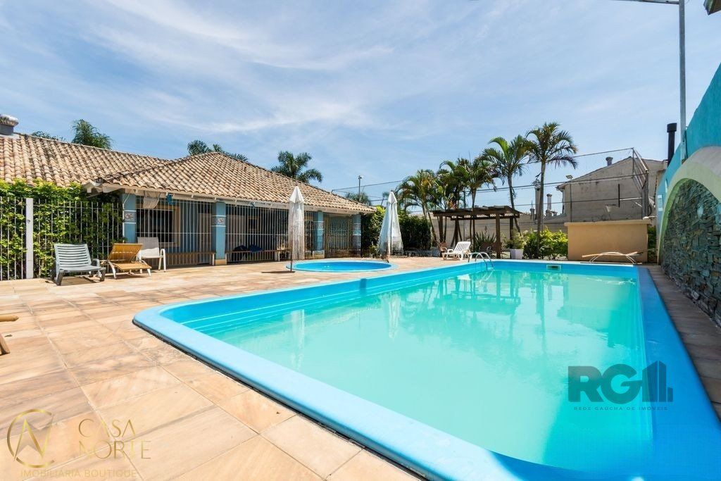 Casa de Condomínio à venda com 3 quartos, 79m², 2 vagas, Avenida José Aloísio Filho no bairro Humaitá em Porto Alegre