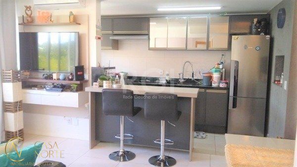 Apartamento à venda com 2 quartos, 59m², 1 suíte, 1 vaga, Rua Dario Totta no bairro Teresópolis em Porto Alegre