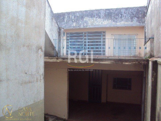 Casa à venda com 5 quartos, 390m², 2 vagas, Rua Barao de Bage no bairro Vila Jardim em Porto Alegre