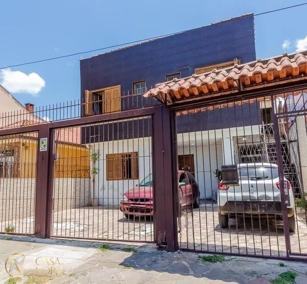 Casa à venda com 4 quartos, 296m², 3 suítes, 3 vagas, Rua Dona Firmina no bairro Partenon em Porto Alegre