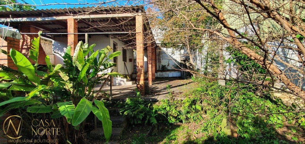 Casa à venda com 4 quartos, 174m², 3 vagas, Rua Luiz de Camões no bairro Santo Antônio em Porto Alegre