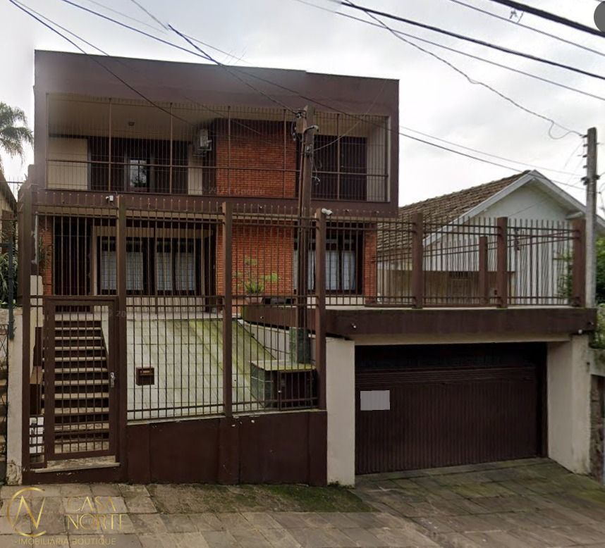 Casa à venda com 4 quartos, 365m², 1 suíte, 2 vagas, Rua Tupanciretã no bairro Passo da Areia em Porto Alegre