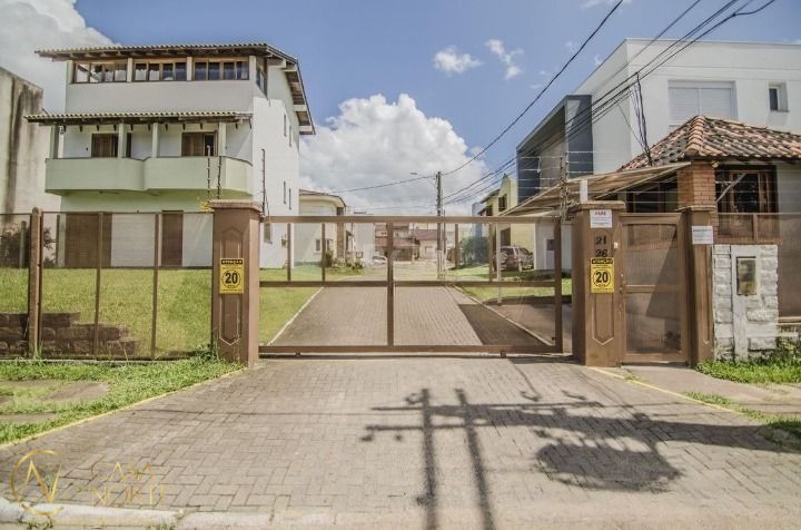 Casa de Condomínio à venda com 3 quartos, 140m², 1 suíte, 2 vagas, Deputado Hugo Mardini no bairro Passo das Pedras em Porto Alegre