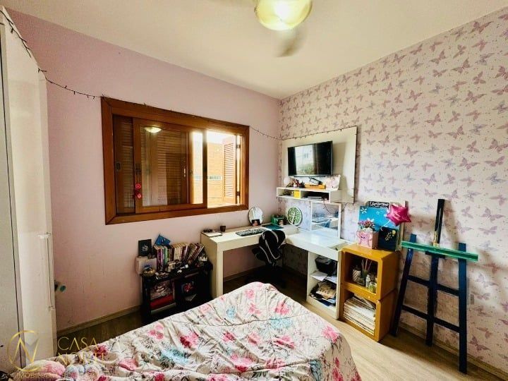 Casa de Condomínio à venda com 3 quartos, 140m², 1 suíte, 2 vagas, Deputado Hugo Mardini no bairro Passo das Pedras em Porto Alegre