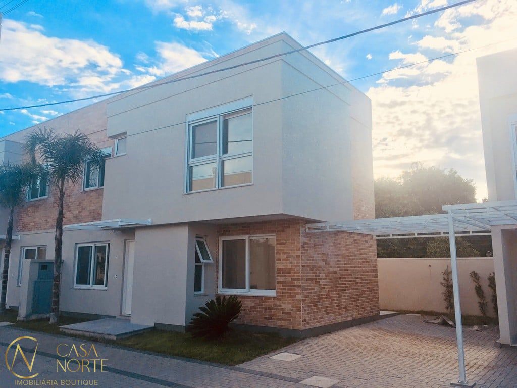 Casa de Condomínio à venda com 3 quartos, 155m², 1 suíte, 2 vagas, João Salomoni no bairro Vila Nova em Porto Alegre