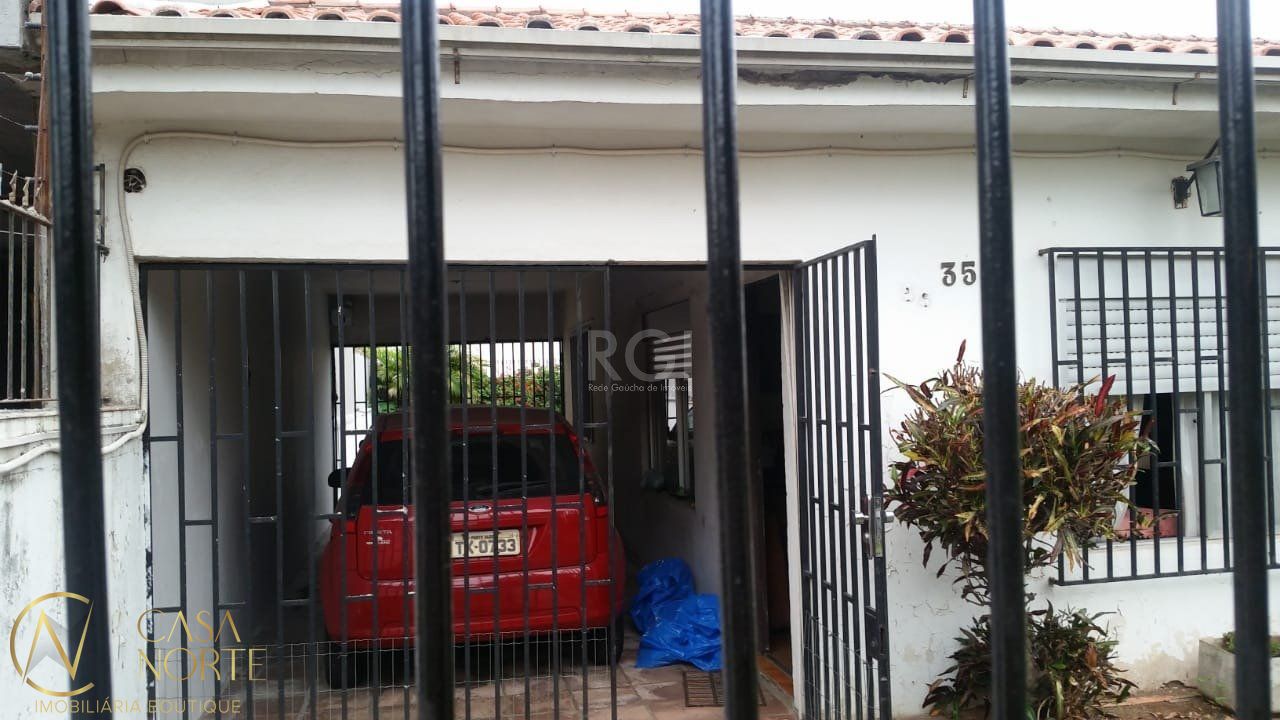 Casa à venda com 2 quartos, 180m², 2 vagas, Rua Oito de Julho no bairro Jardim  Botânico em Porto Alegre