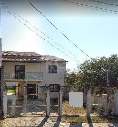 Casa à venda com 3 quartos, 147m², 2 vagas, Avenida Doutor Petronio Portella no bairro Parque Santa Fé em Porto Alegre