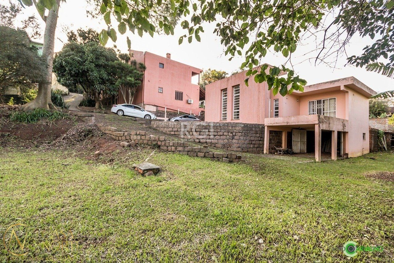 Terreno à venda  com 3304m², Avenida Vicente Monteggia no bairro Cavalhada em Porto Alegre