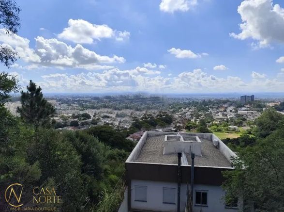 Casa à venda com 3 quartos, 1 suíte, 2 vagas, Rua Professor Luiz Antônio Lopes no bairro Morro Santana em Porto Alegre