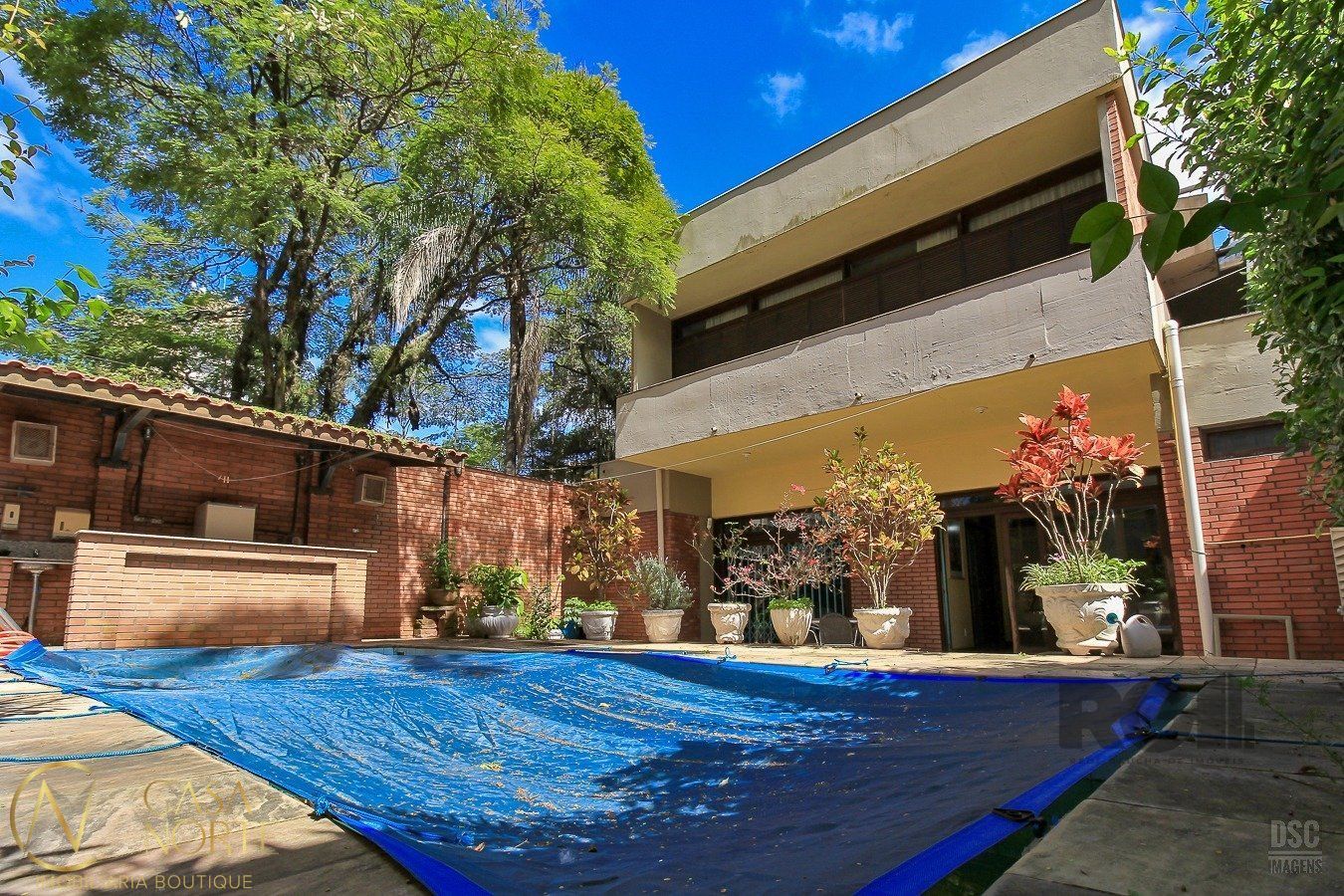 Casa à venda com 4 quartos, 480m², 4 suítes, 4 vagas, Rua Dario Pederneiras no bairro Petrópolis em Porto Alegre