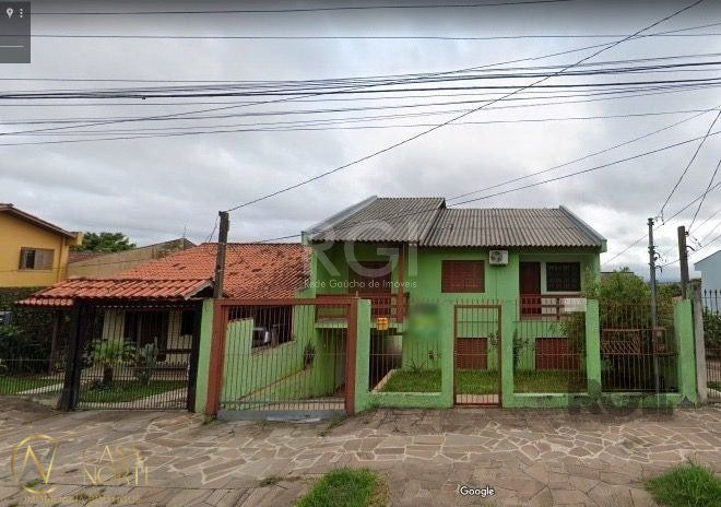 Casa à venda com 4 quartos, 204m², 1 suíte, 2 vagas, Rua Lauro Rodrigues no bairro Costa e Silva em Porto Alegre