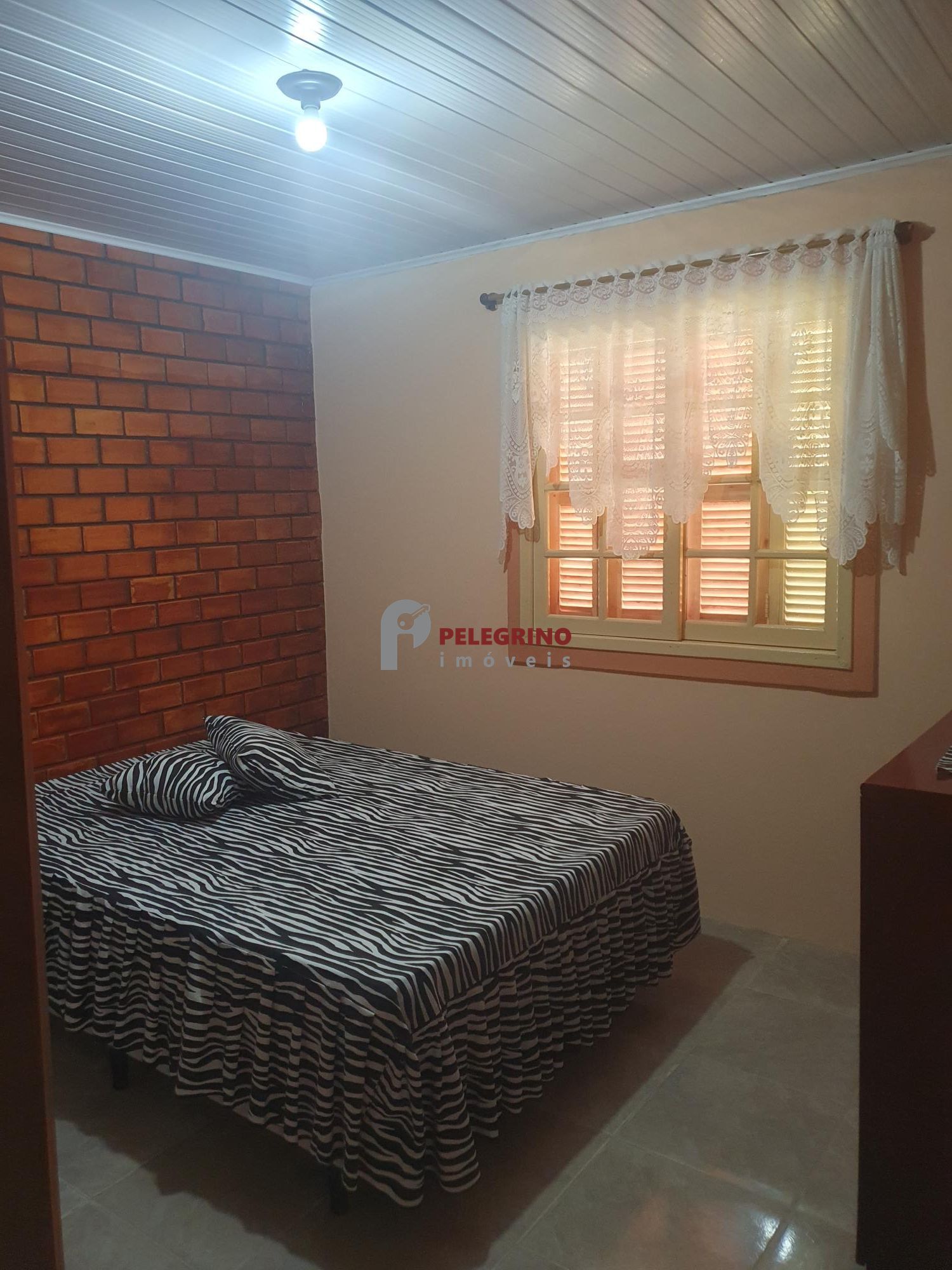Pelegrino Imóveis vende casa no Balneário Rebello em Tapes