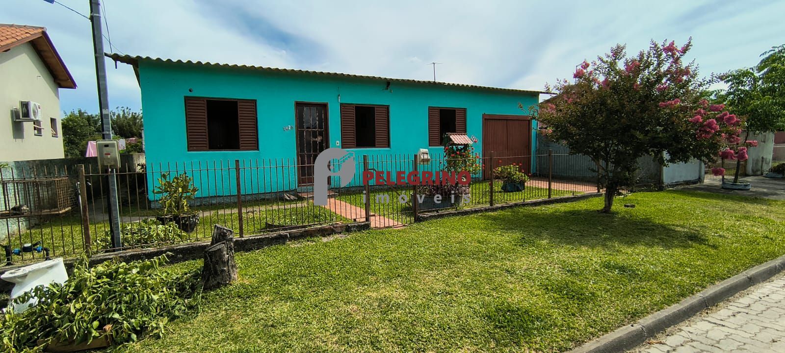 Pelegrino imóveis vende casa no centro de tapes