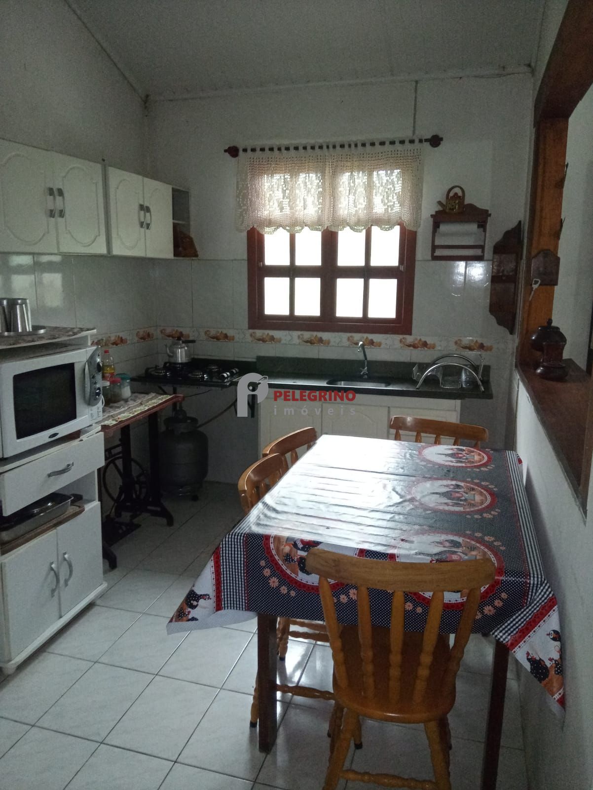 Pelegrino imóveis vende casa em tramandaí