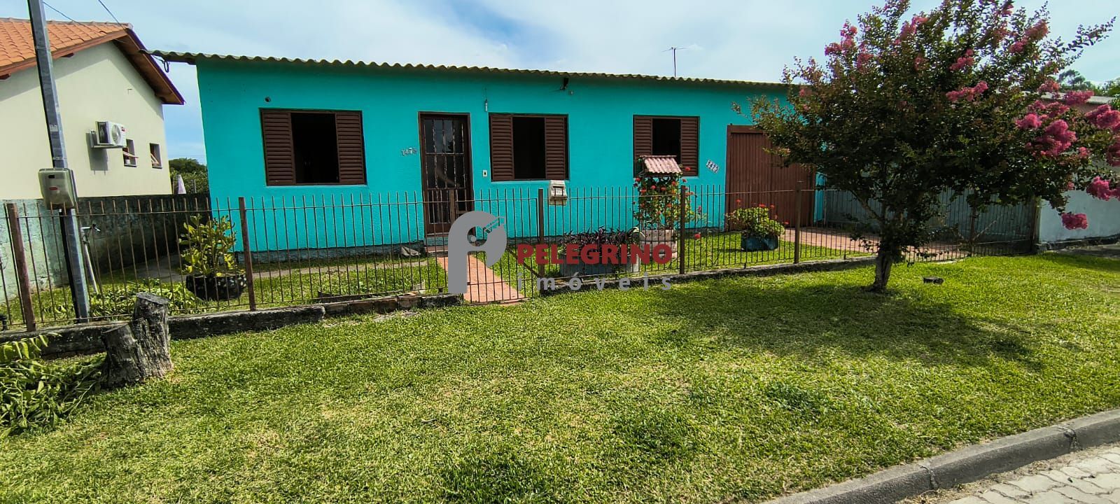 Pelegrino imóveis vende casa no centro de tapes