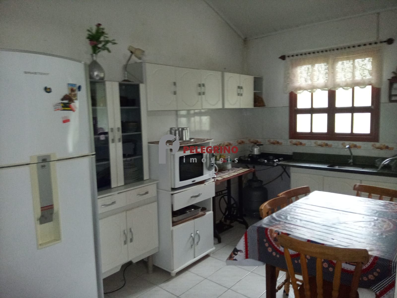 Pelegrino imóveis vende casa em tramandaí