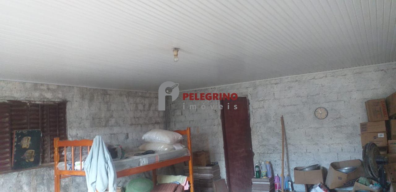 Pelegrino Imóveis vende casa com dois terrenos na General Osório