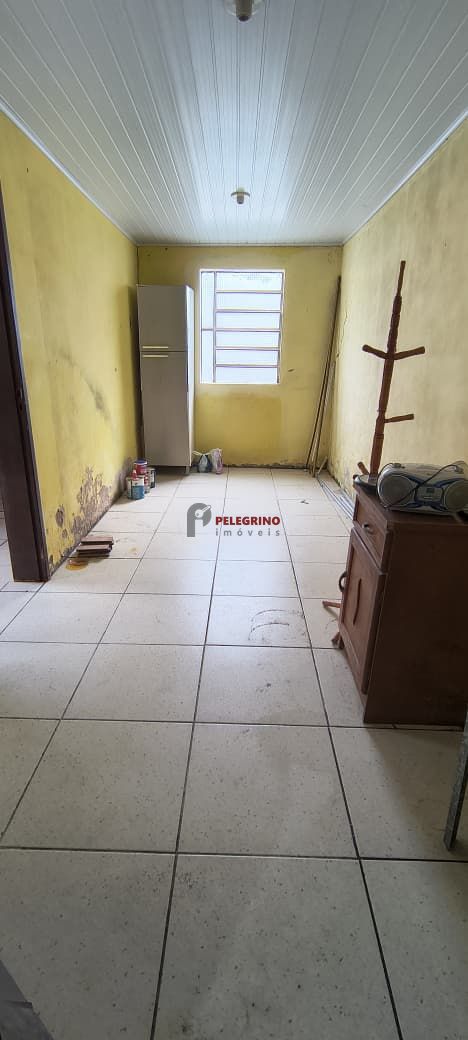 Pelegrino Imóveis vende casa no centro de Tapes - foto 18
