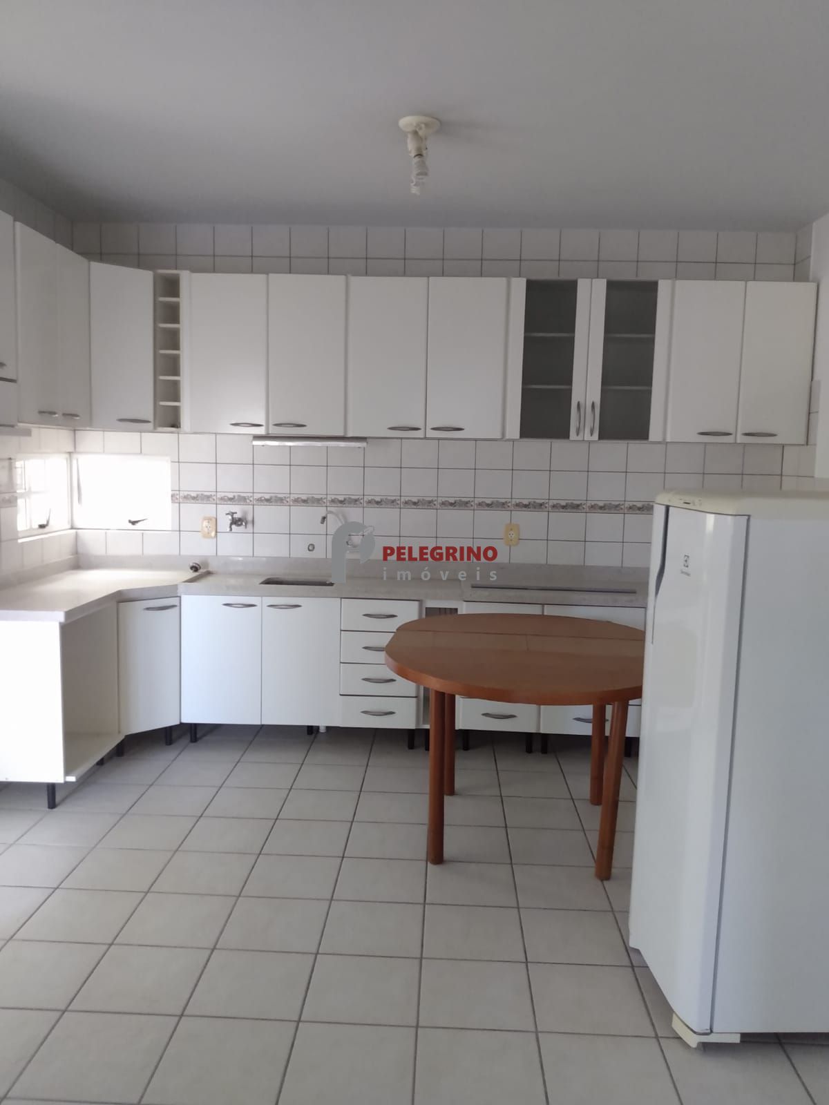 Pelegrino imóveis vende apartamento no centro em tapes