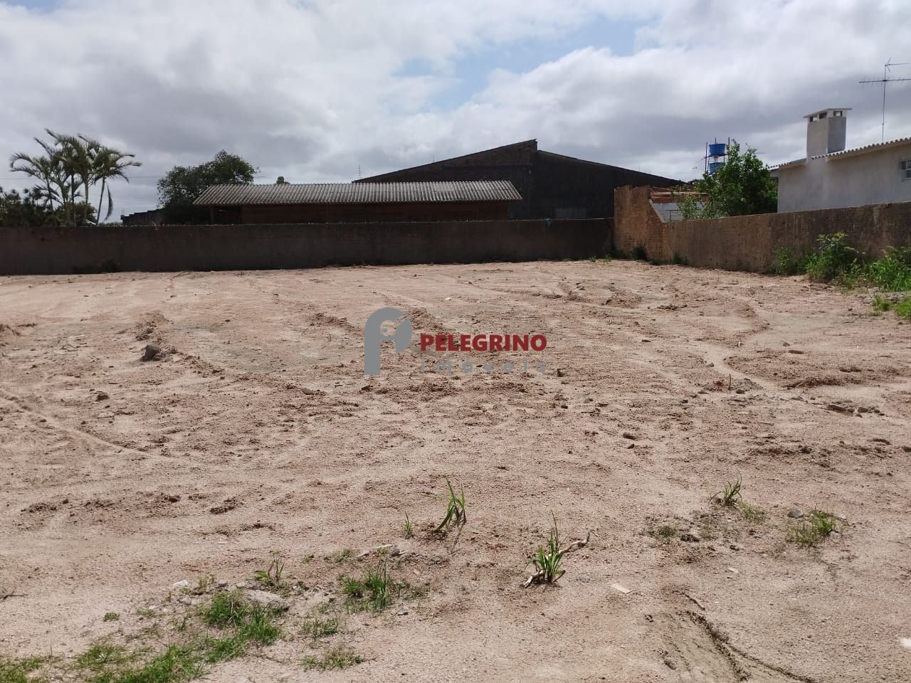 Pelegrino imóveis vende terreno no centro de tapes