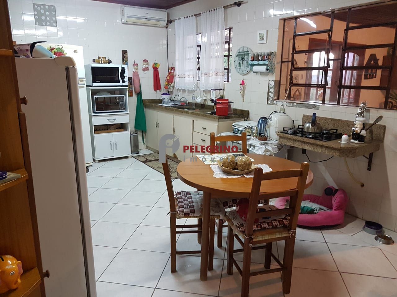Pelegrino Imóveis vende ótima residência no Centro de Tapes
