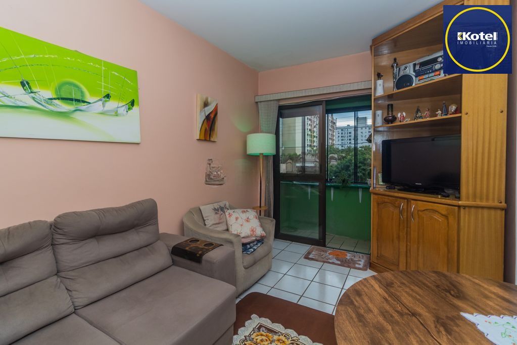 Apartamento iluminado com 2 dormitórios e vaga escriturada
