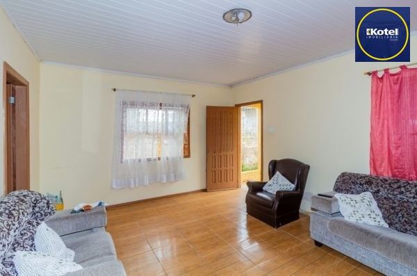 Casa / Terreno com 3 casas de alvenaria no bairro Morro Santana