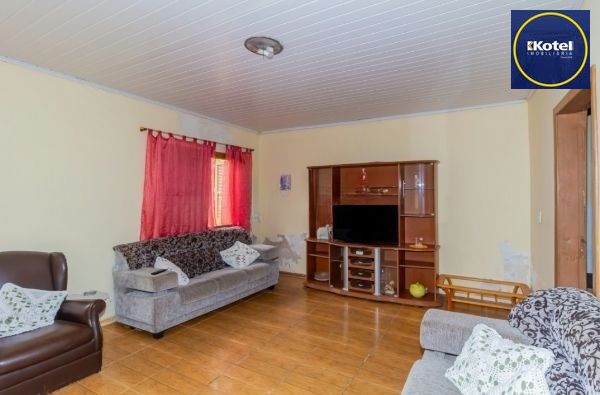 Casa / Terreno com 3 casas de alvenaria no bairro Morro Santana