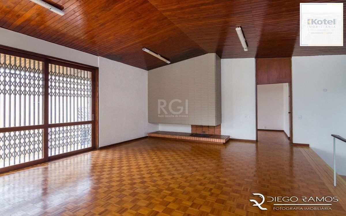 Venda de casa residencial 25,00m x 80,00m- Menino Deus. 4 vagas, 4 dormitórios, sendo 1 suíte, 1 varanda, lareira e churrasqueira. — foto 3
