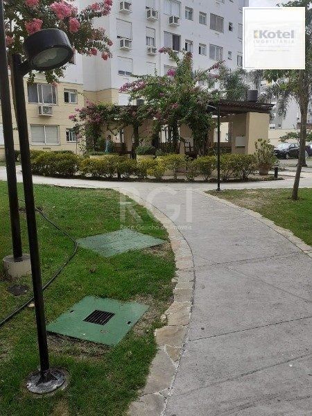 Apartamento 2 dormitórios e 1 vaga de garagem escriturada, no bairro Cristal — foto 4