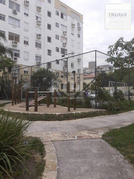 Apartamento 2 dormitórios e 1 vaga de garagem escriturada, no bairro Cristal — foto 2