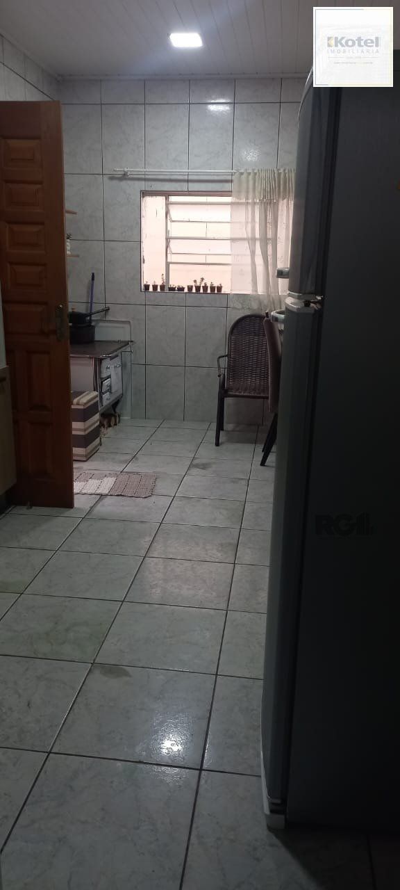Convido você a conhecer esta encantadora casa, localizada em Gravataí/RS.
